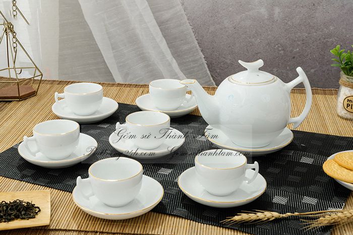 Mua bộ ấm trà men trắng viền vàng kim in logo